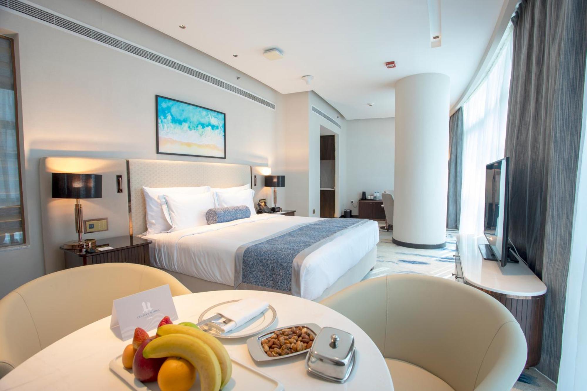Century Marina Hotel - Lusail Exterior foto A bedroom at the hotel