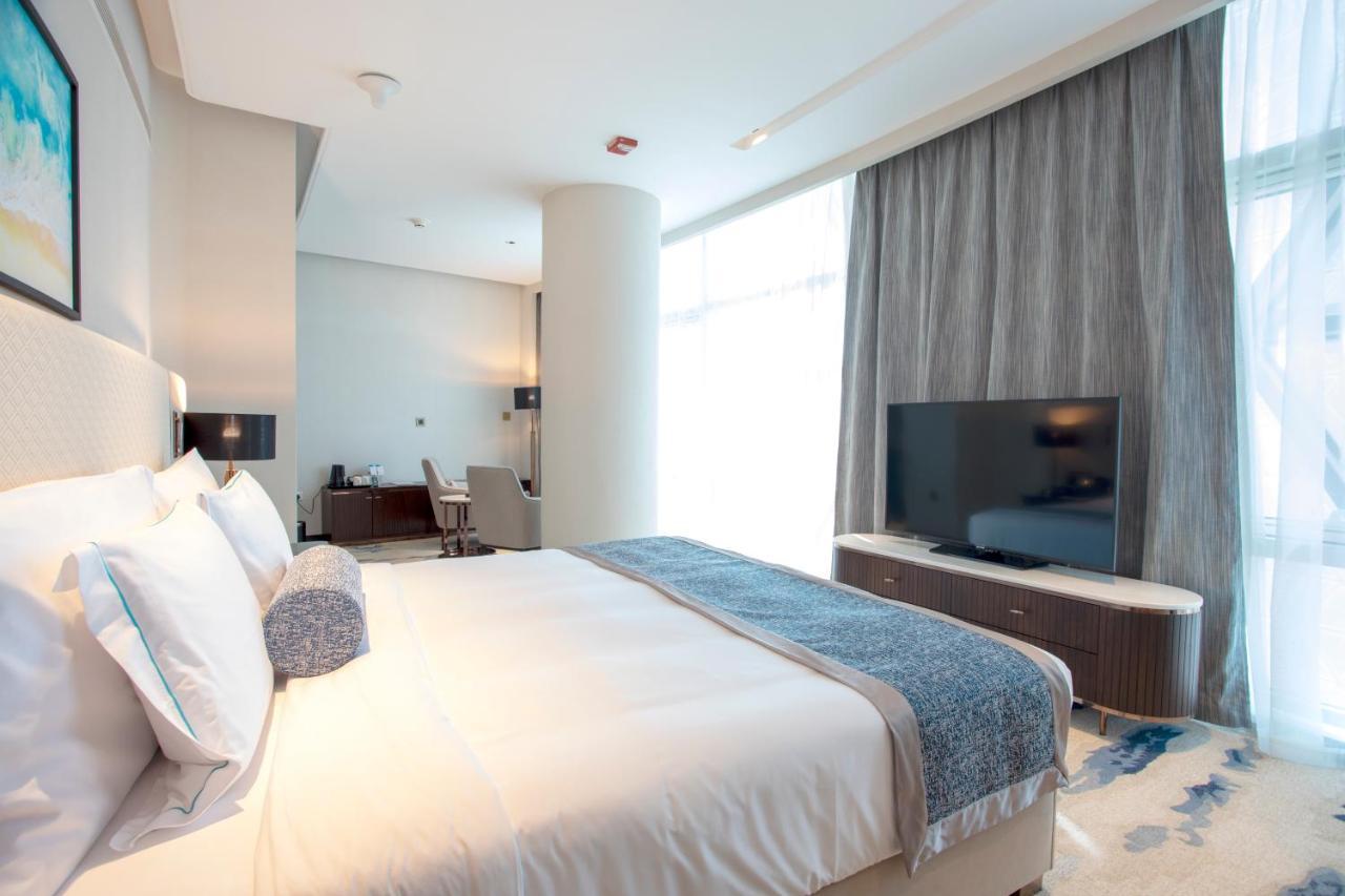 Century Marina Hotel - Lusail Exterior foto A bedroom at the hotel