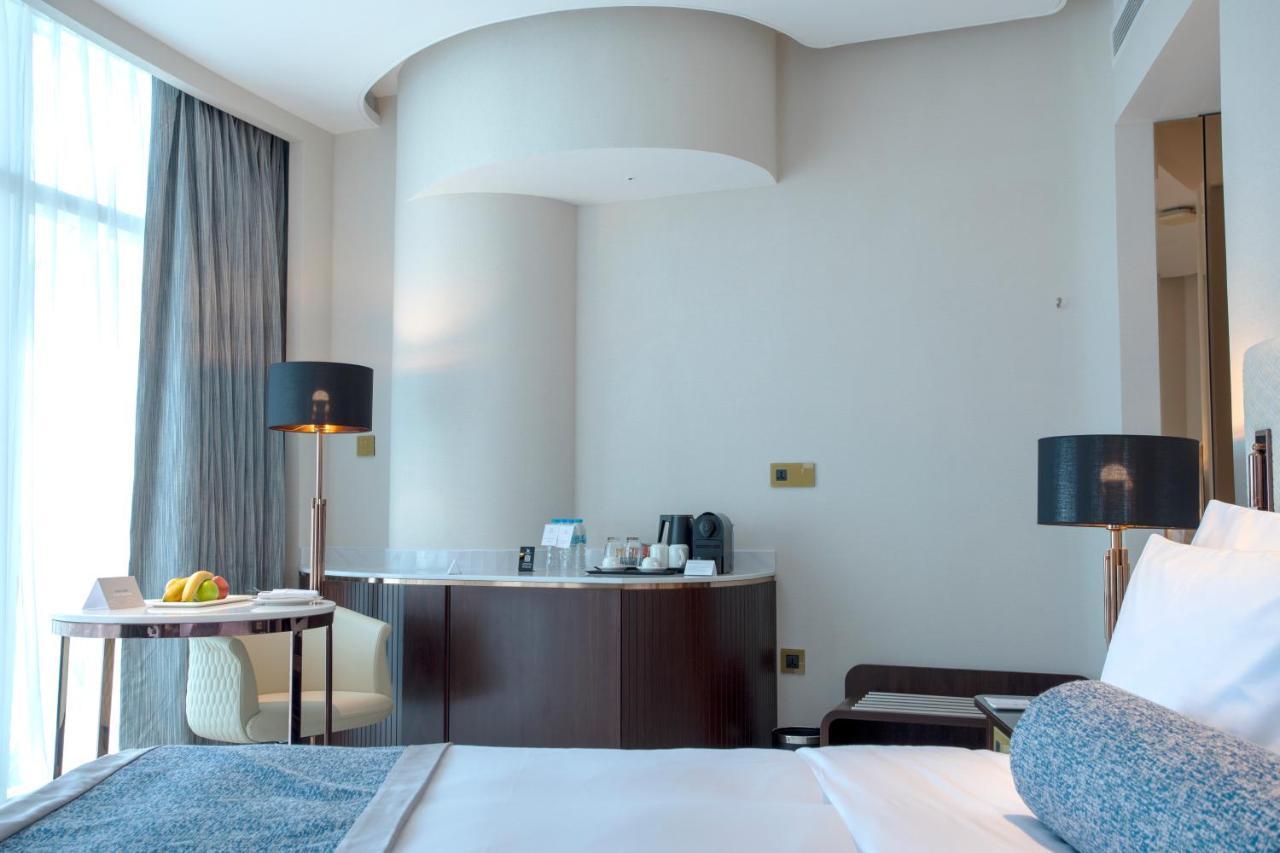 Century Marina Hotel - Lusail Exterior foto A room at the hotel