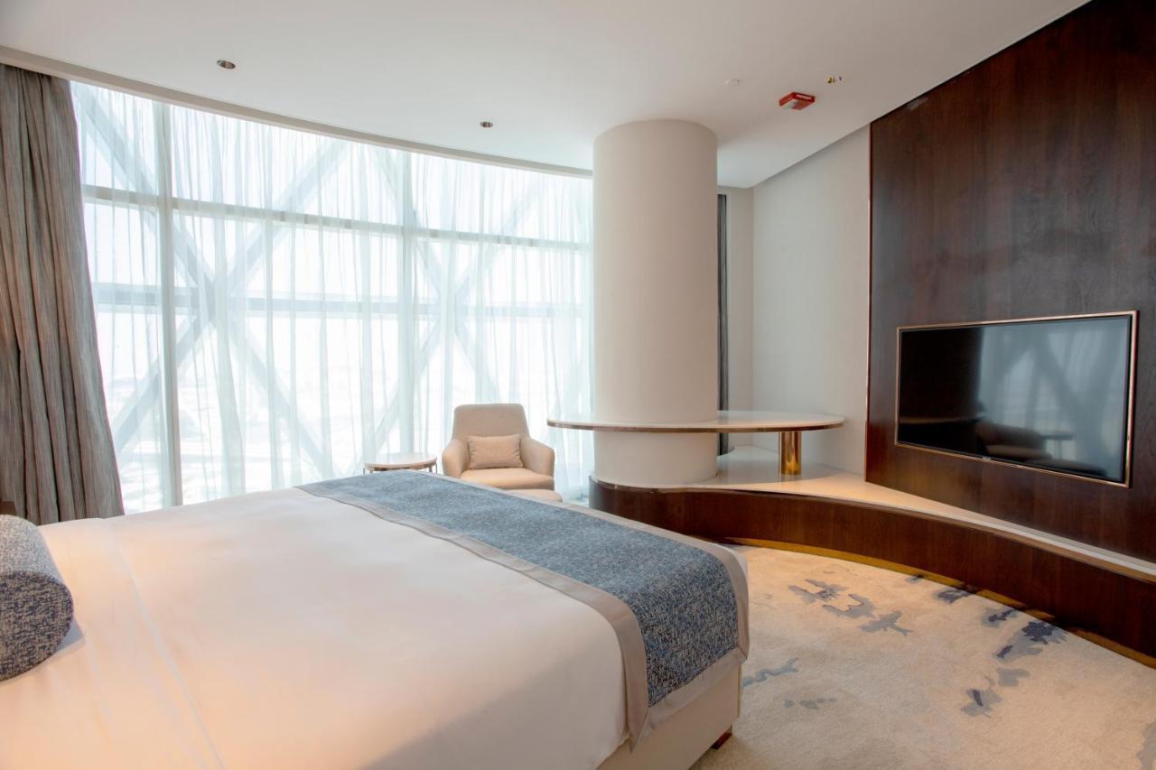 Century Marina Hotel - Lusail Exterior foto A bedroom at the hotel