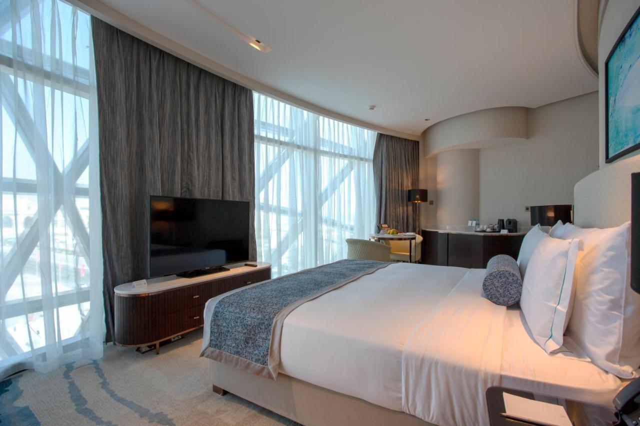 Century Marina Hotel - Lusail Exterior foto A bedroom at the hotel