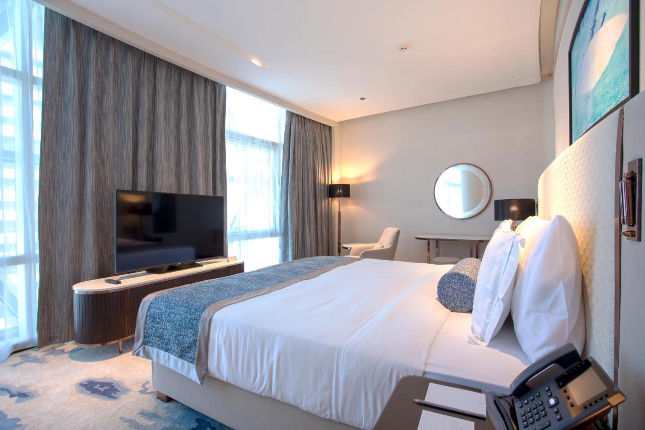 Century Marina Hotel - Lusail Exterior foto A bedroom at the hotel