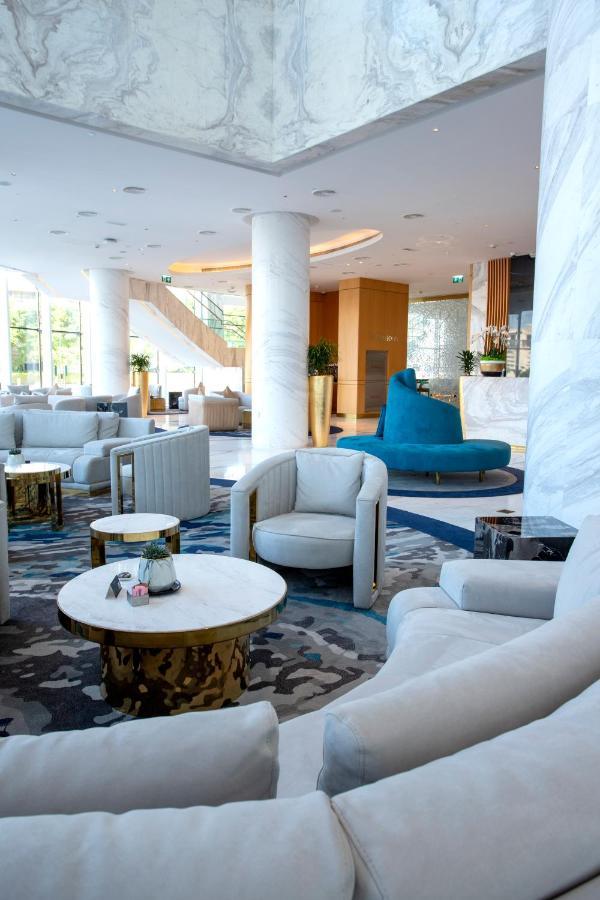 Century Marina Hotel - Lusail Exterior foto Lobby